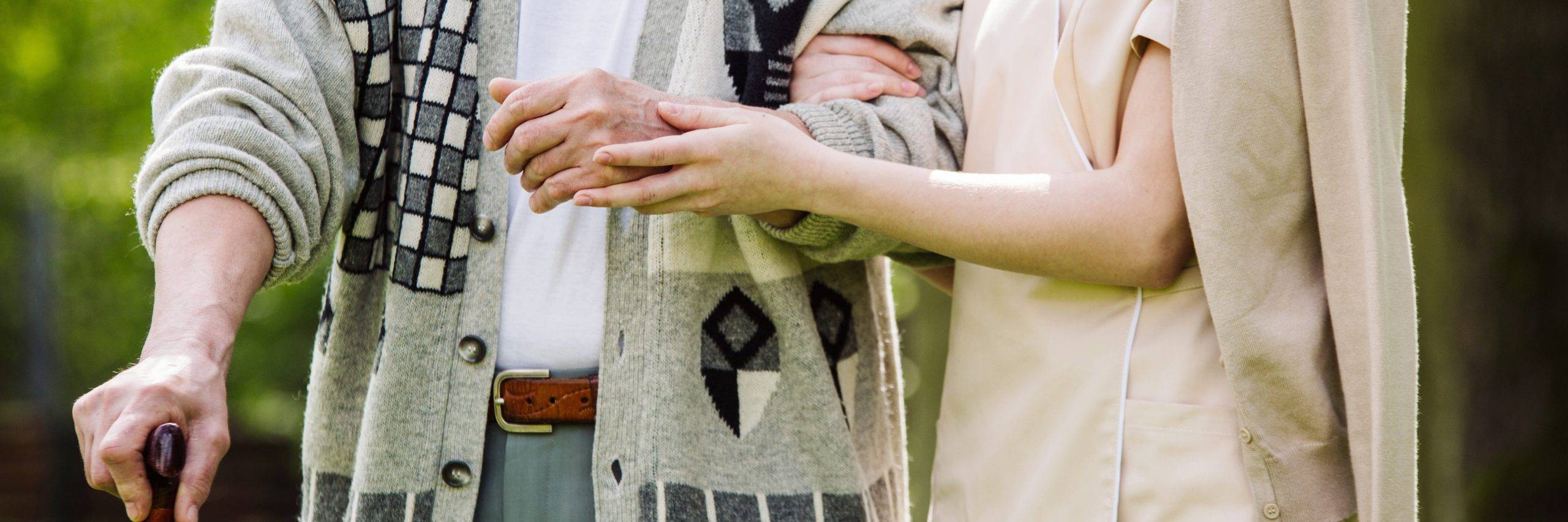 Caregiver and her patient in the nursing home